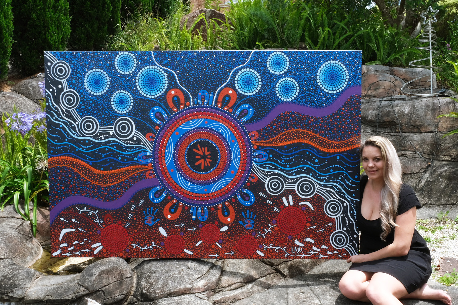 Lani Balzan with the commissioned ADC RAP painting